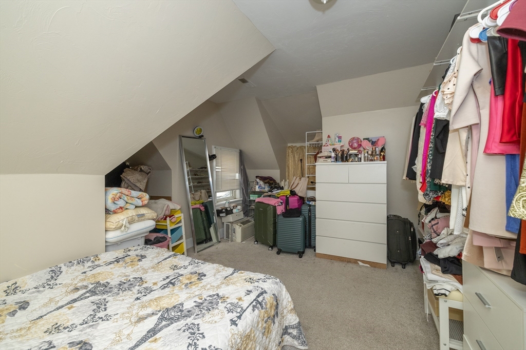 35 May Street Worcester, MA 01610 - Photo 5 of 30 a bedroom with a bed and a closet
