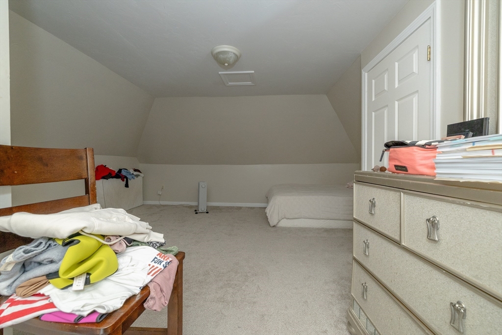 35 May Street Worcester, MA 01610 - Photo 9 of 30 a bathroom with a sink mirror and vanity