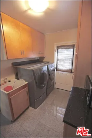 a bed room with a bed and a dresser