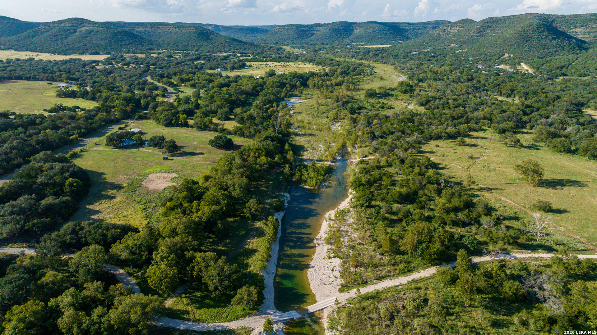 0 Rm 336 Leakey, TX 78873 - Photo 35 of 93 an aerial view of residential houses with outdoor space and trees