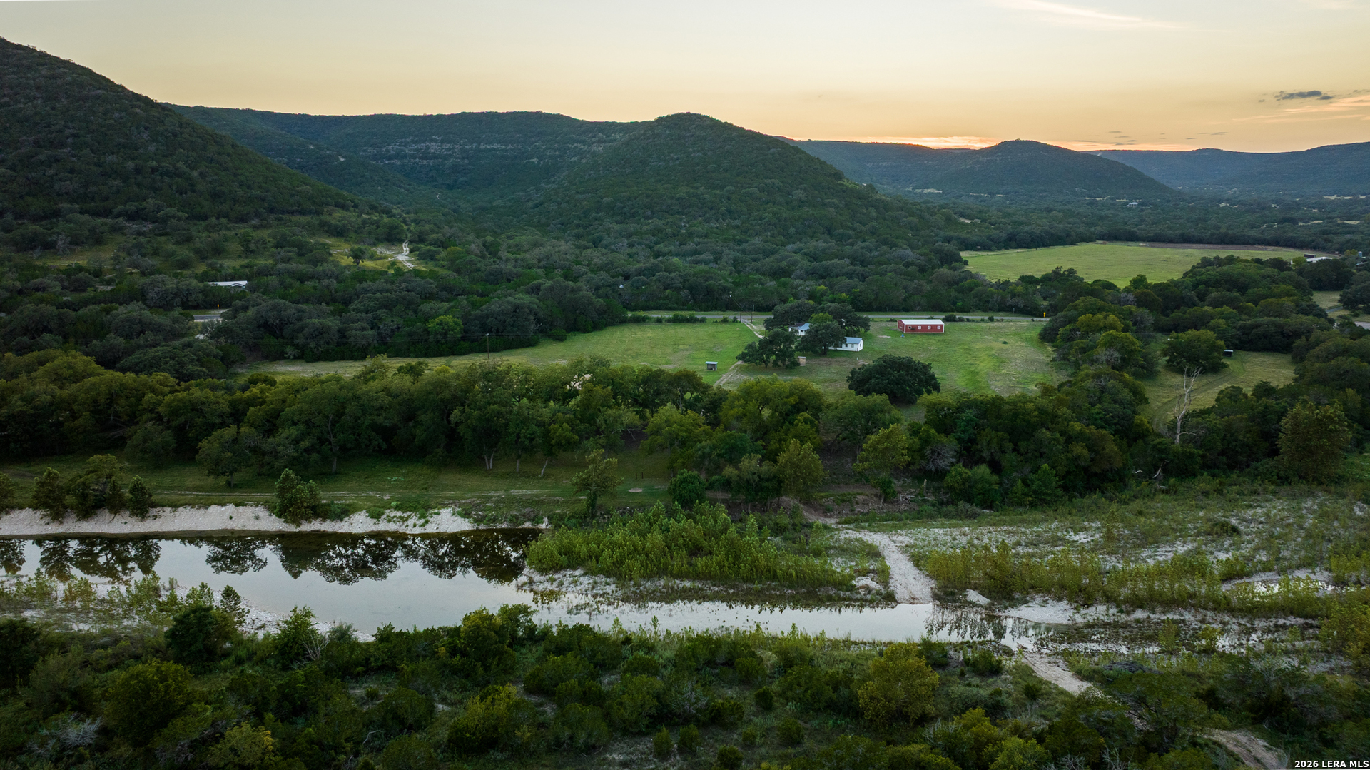 0 Rm 336 Leakey, TX 78873 - Photo 39 of 93 a view of a lush green hillside and houses