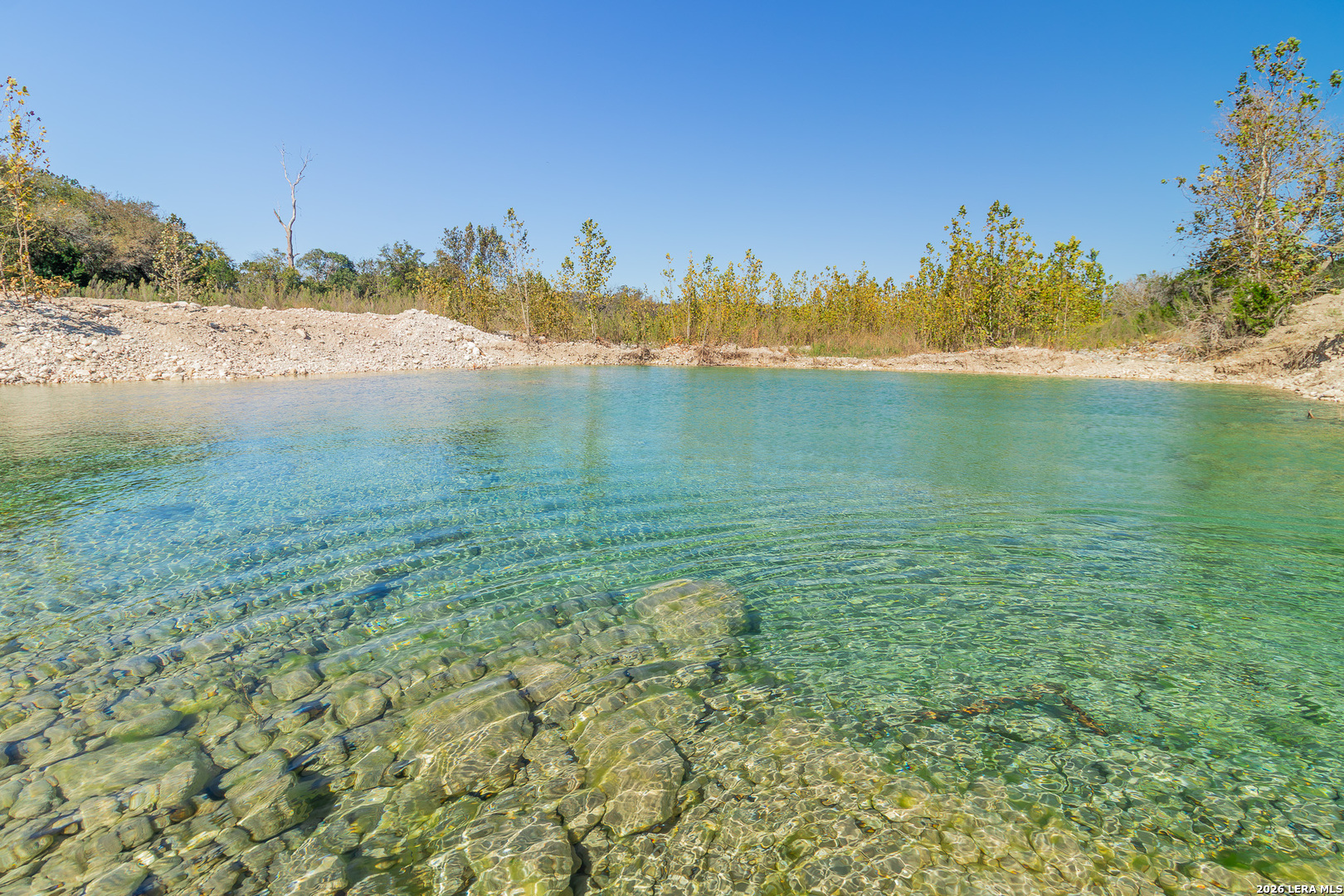 0 Rm 336 Leakey, TX 78873 - Photo 4 of 93 a view of a lake with houses in the background
