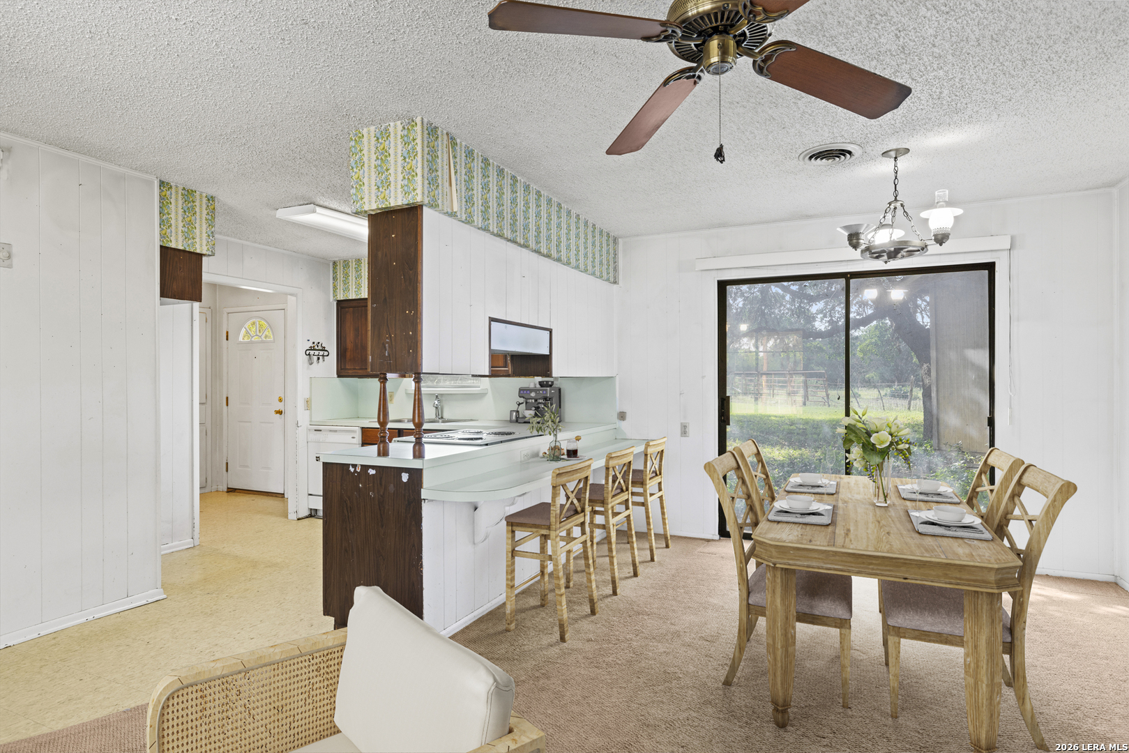 0 Rm 336 Leakey, TX 78873 - Photo 41 of 77 a dining room with furniture a chandelier and window