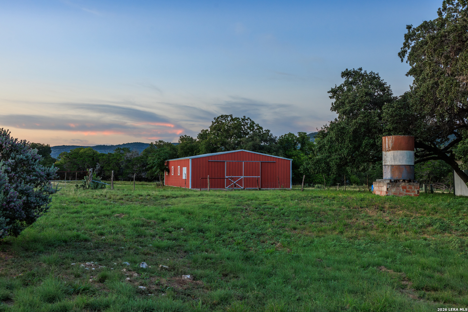 0 Rm 336 Leakey, TX 78873 - Photo 7 of 93 a backyard of a house with lots of green space and garden