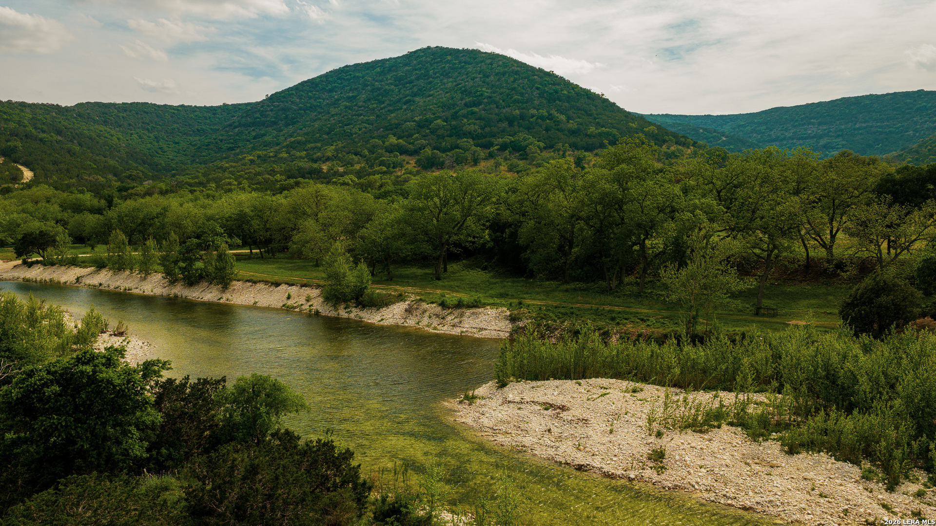 0 Rm 336 Leakey, TX 78873 - Photo 8 of 77 a view of a lake with a mountain in the background