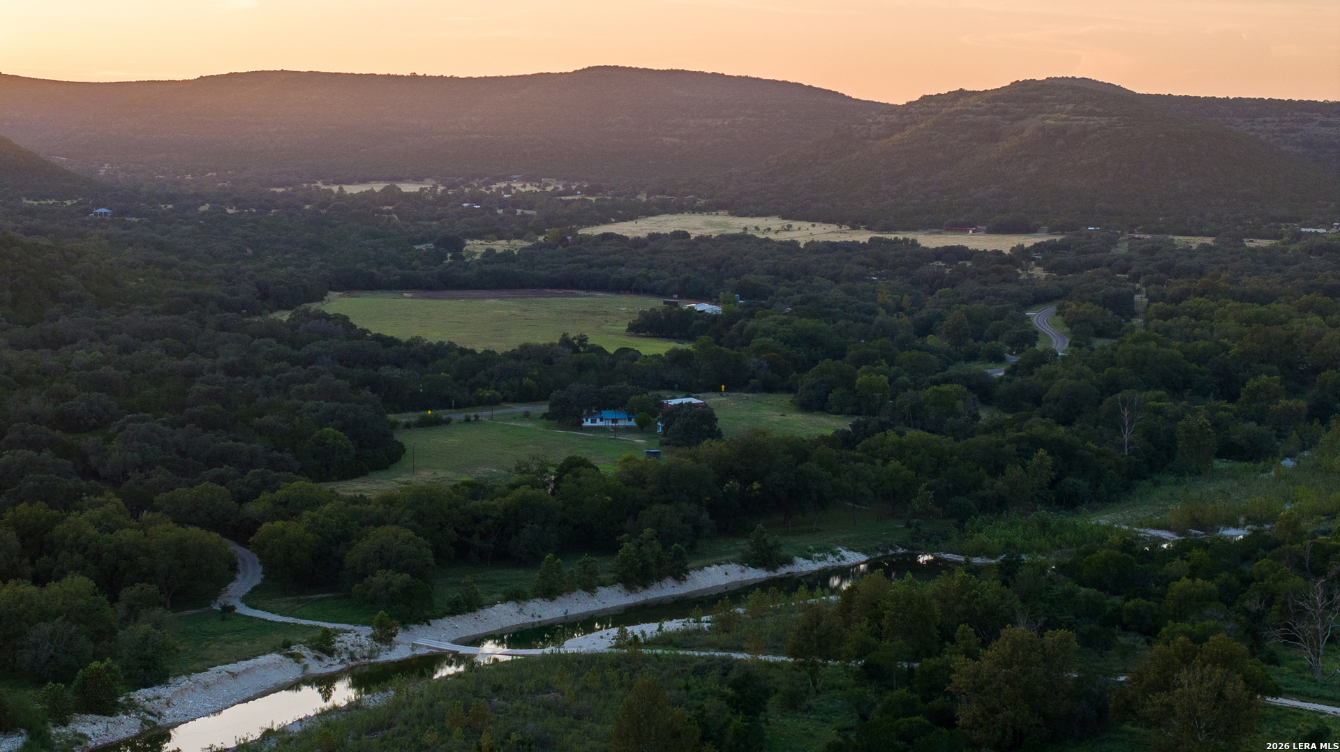 0 Rm 336 Leakey, TX 78873 - Photo 82 of 93 an aerial view of residential house with outdoor space and trees all around
