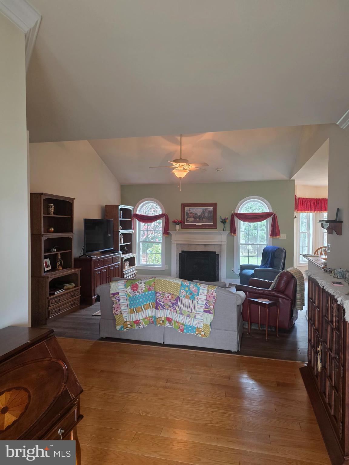 405 Custer Court Berryville, VA 22611 - Photo 15 of 34 a living room with furniture and a flat screen tv