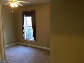 405 Custer Court Berryville, VA 22611 - Photo 23 of 34 an empty room with a window