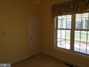 405 Custer Court Berryville, VA 22611 - Photo 24 of 34 a view of an empty room and window