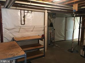 405 Custer Court Berryville, VA 22611 - Photo 30 of 34 a bathroom with a sink and mirror