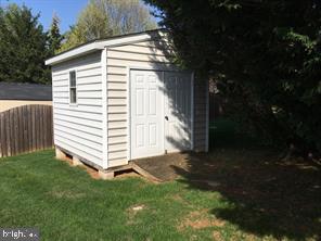 405 Custer Court Berryville, VA 22611 - Photo 4 of 34 a view of a white house with a yard