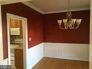 405 Custer Court Berryville, VA 22611 - Photo 8 of 34 a view of kitchen cabinet and window