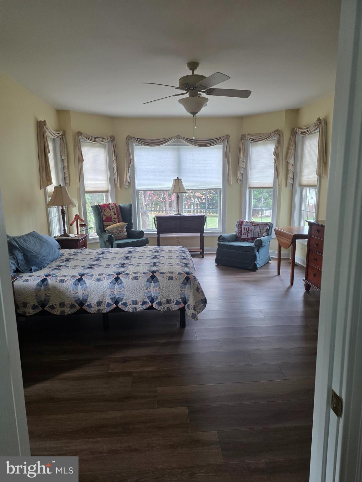 405 Custer Court Berryville, VA 22611 - Photo 9 of 34 a bedroom with a bed and wooden floor