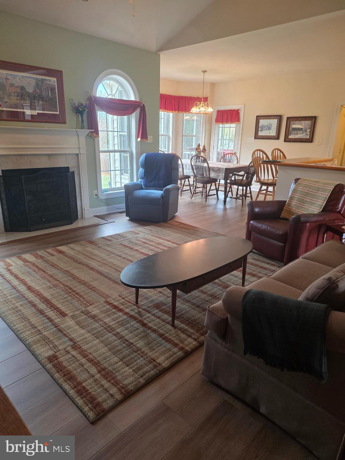 405 Custer Court Berryville, VA 22611 - Photo 10 of 34 a living room with furniture and a fireplace