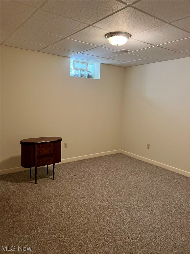 185 B Mathews Road Youngstown, OH 44512 - Photo 29 of 35 Basement with a drop ceiling and light carpet