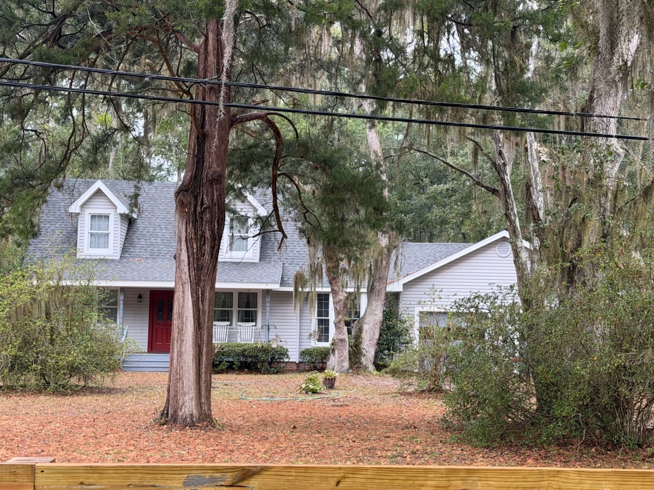 96125 Glenwood Road Yulee, FL 32097 - Photo 1 of 2 a view of a house with a yard
