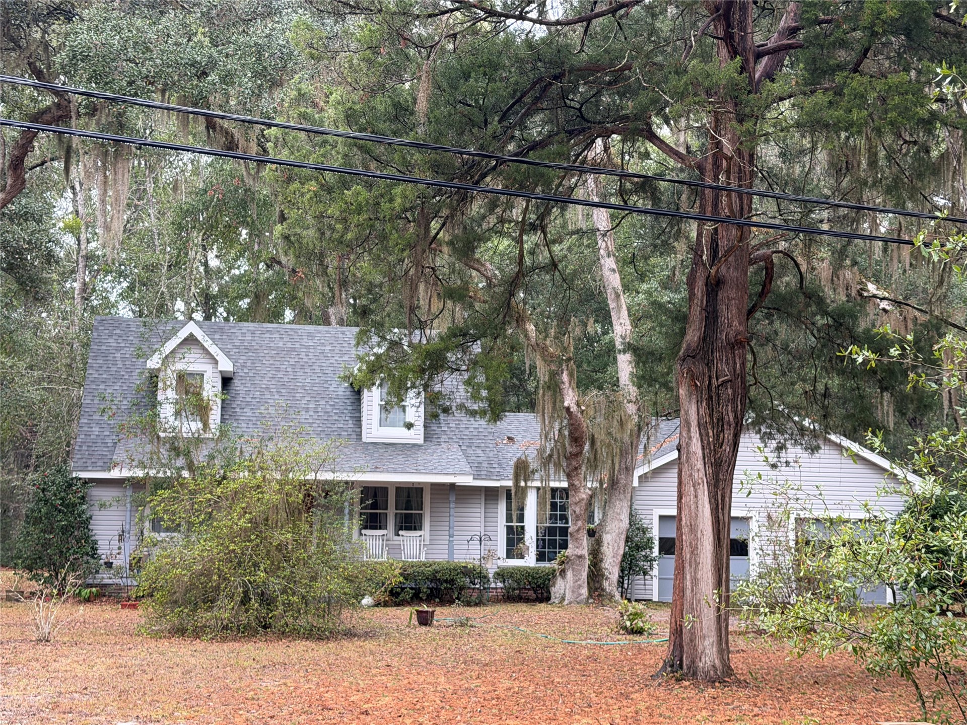 96125 Glenwood Road Yulee, FL 32097 - Photo 2 of 2 a view of a house with a tree in front