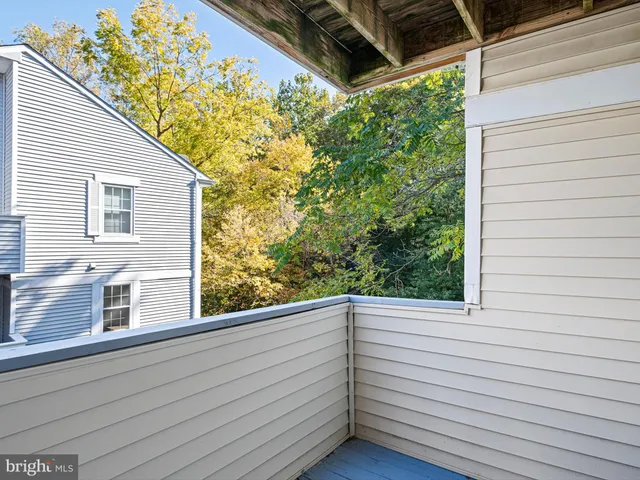a kitchen with granite countertop cabinets and steel stainless steel appliances