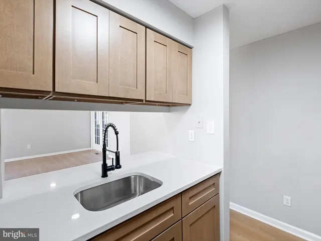 a kitchen with a stove and a microwave