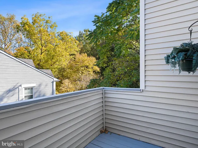 a view of a balcony with chair