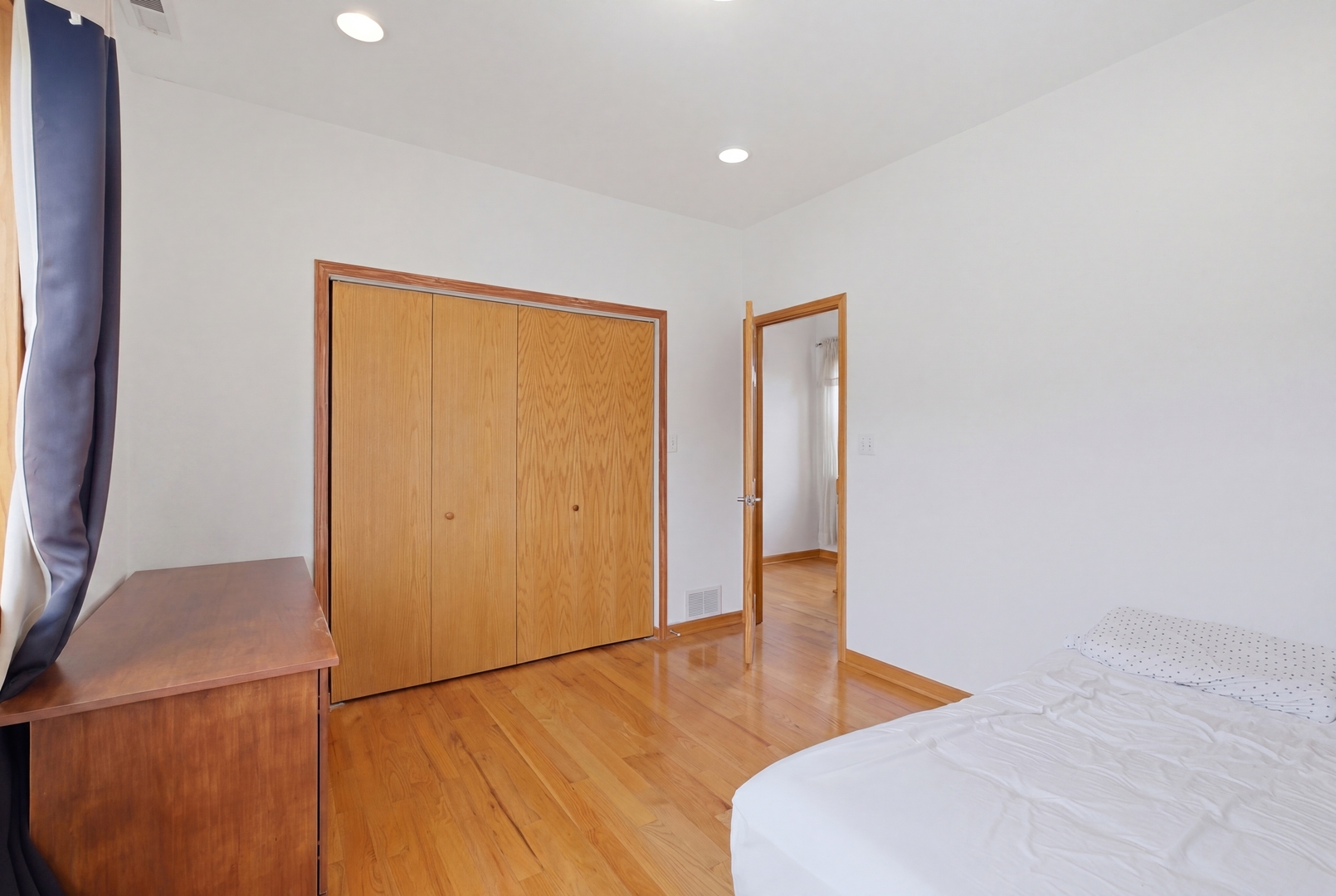 3917 West 60th Street Chicago, IL 60629 - Photo 17 of 34 a view of a room with wooden floor