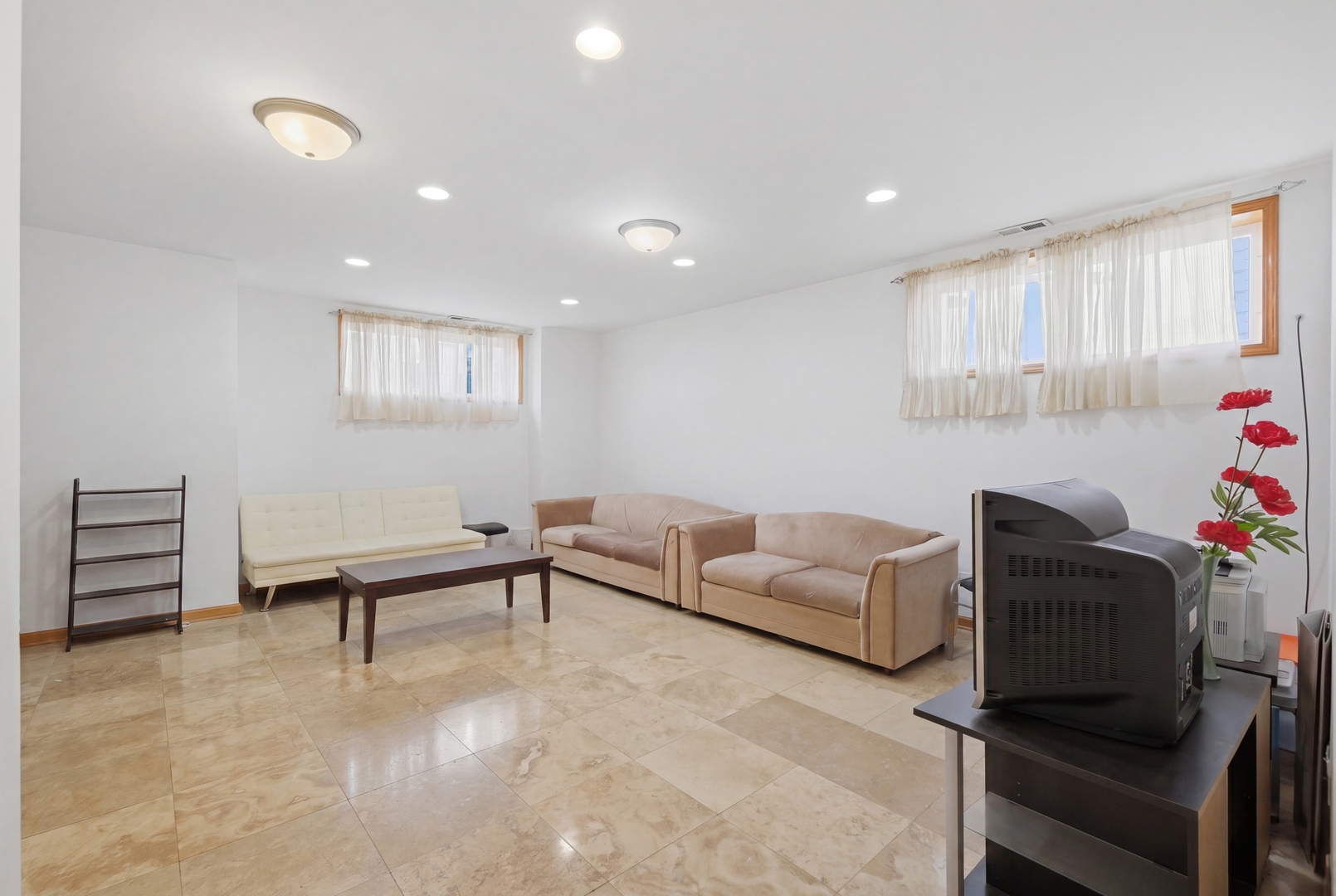 3917 West 60th Street Chicago, IL 60629 - Photo 21 of 34 a living room with furniture and a wooden floor