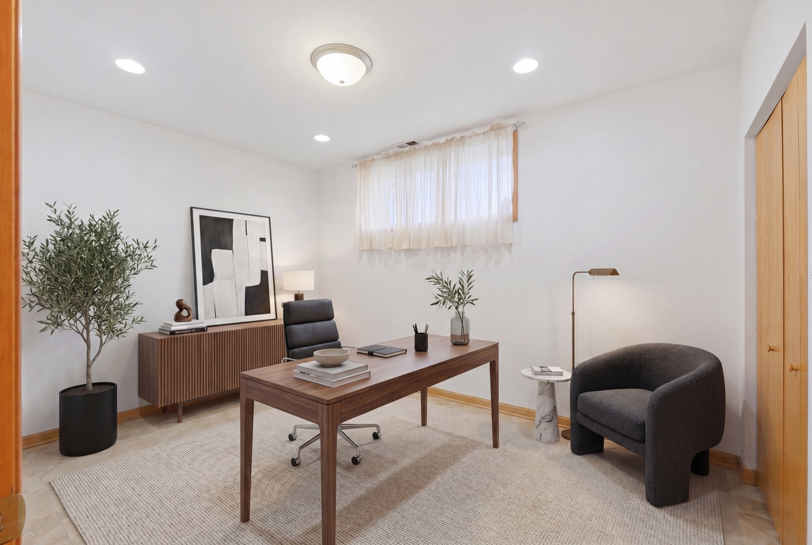 3917 West 60th Street Chicago, IL 60629 - Photo 24 of 34 a living room with furniture and a potted plant