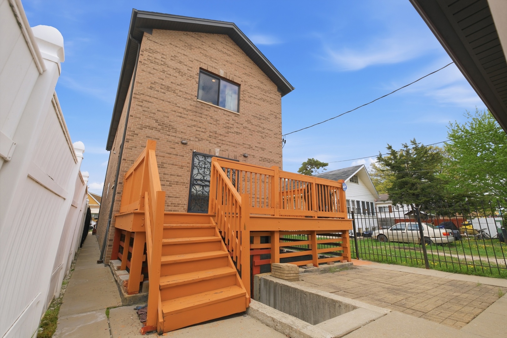 3917 West 60th Street Chicago, IL 60629 - Photo 27 of 34 a view of a house with wooden fence