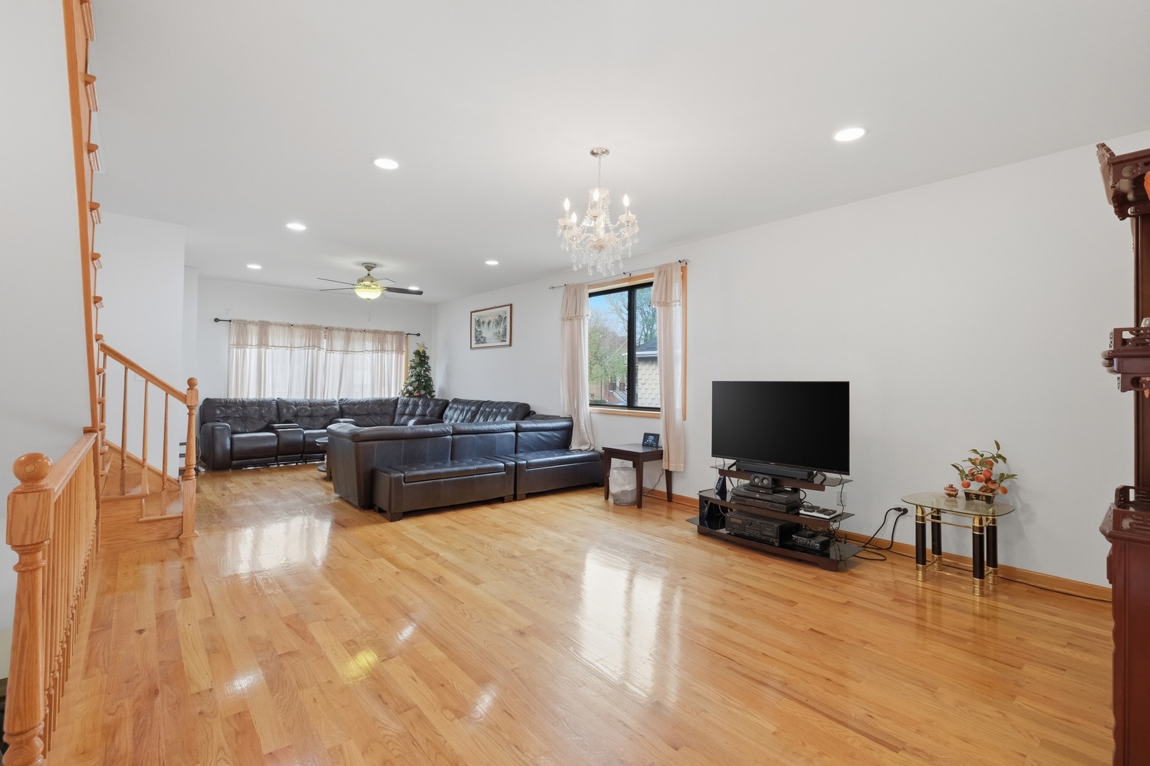 3917 West 60th Street Chicago, IL 60629 - Photo 3 of 34 a living room with furniture and a flat screen tv
