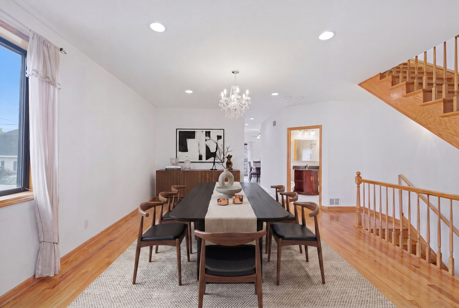 3917 West 60th Street Chicago, IL 60629 - Photo 5 of 34 a view of a dining room with furniture and wooden floor