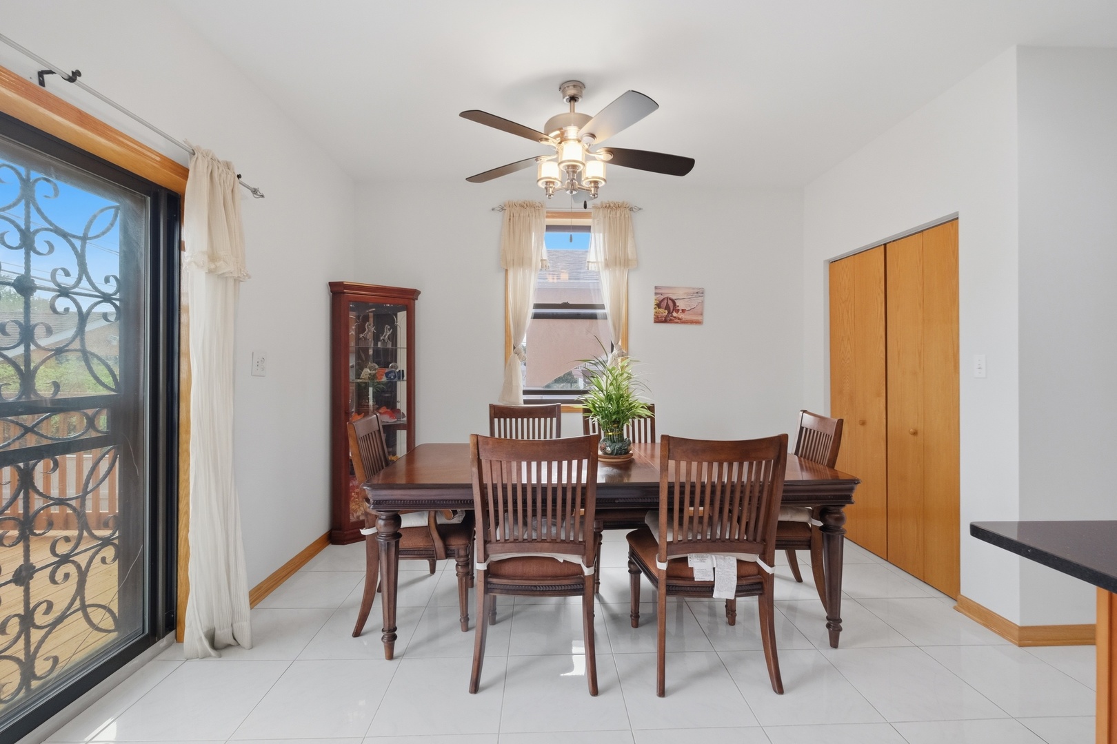 3917 West 60th Street Chicago, IL 60629 - Photo 9 of 34 a view of a dining room with furniture and a chandelier