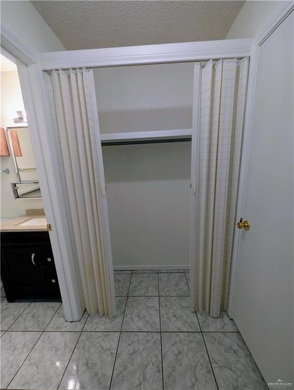 807 East 21st Street, Unit 2 Mission, TX 78572 - Photo 14 of 16 View of interior of second his and her closet