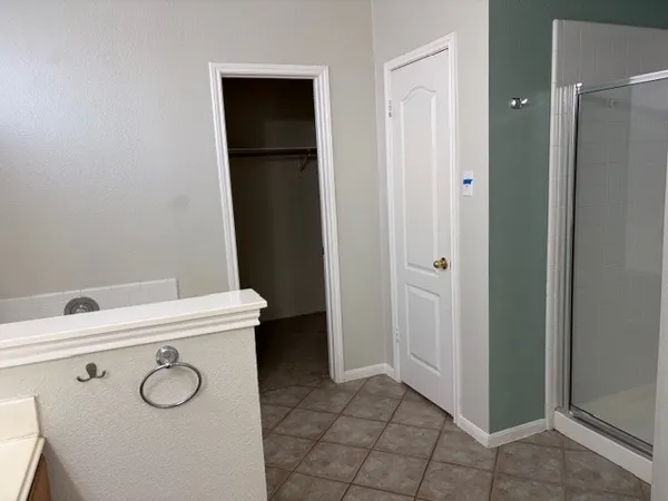 a view of an empty walk in closet