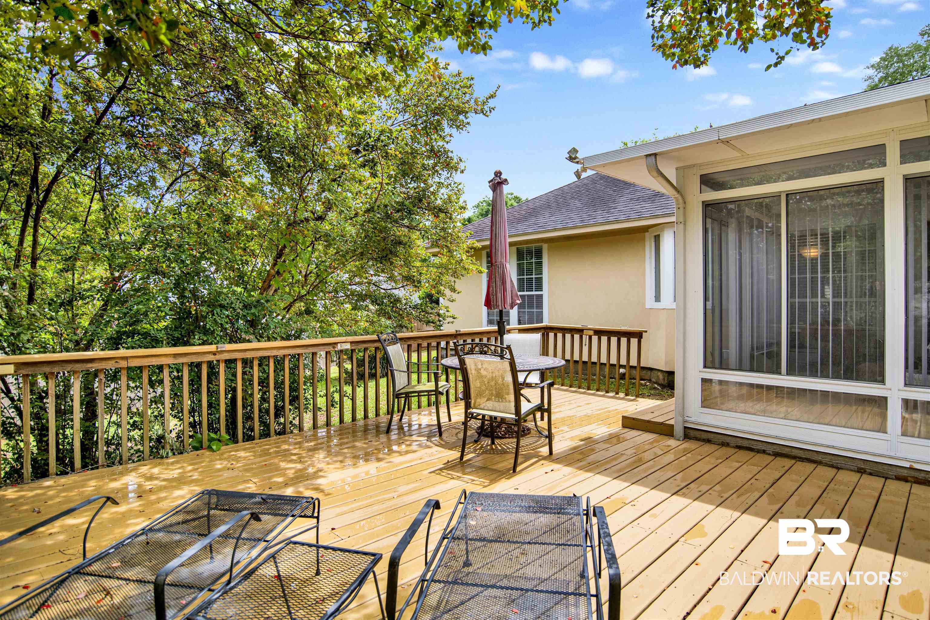 107 Virginia Circle Daphne, AL 36526 - Photo 33 of 47 Expansive wood-finish deck with a full railing system