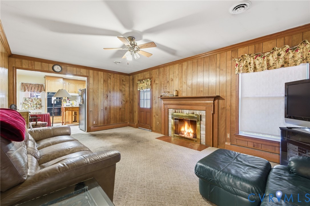 4500 Vauxhall Road Richmond, VA 23234 - Photo 15 of 30 Living room with light colored carpet, ornamental