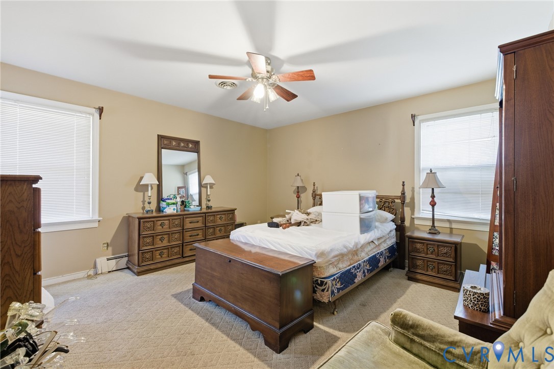 4500 Vauxhall Road Richmond, VA 23234 - Photo 20 of 30 Bedroom with a ceiling fan, carpet, and baseboard