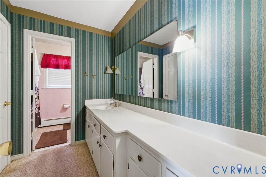 4500 Vauxhall Road Richmond, VA 23234 - Photo 23 of 30 Full bathroom featuring vanity, a shower with show