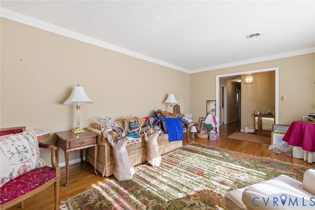 4500 Vauxhall Road Richmond, VA 23234 - Photo 6 of 30 Living room featuring wood finished floors and orn