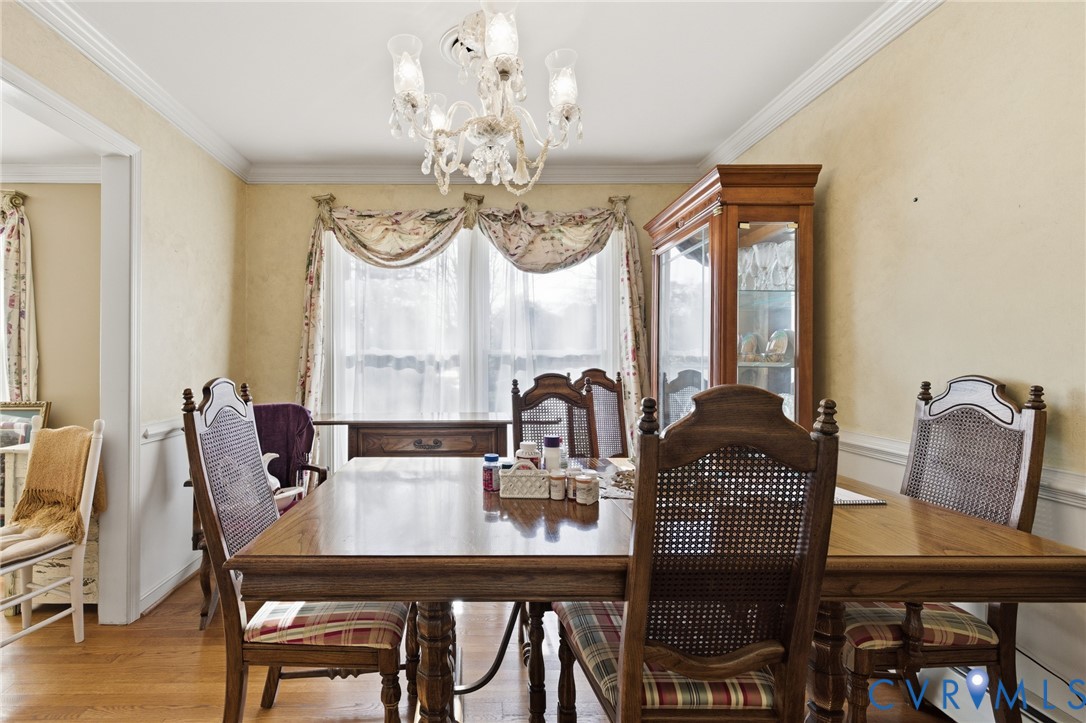 4500 Vauxhall Road Richmond, VA 23234 - Photo 8 of 30 Dining area featuring crown molding, wood finished