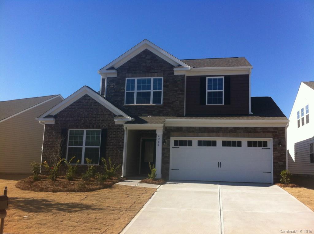 4286 Perth Road, Unit 316 Indian Land, SC 29707 - Photo 1 of 10 a front view of a house with garage