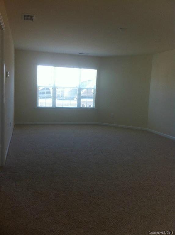4286 Perth Road, Unit 316 Indian Land, SC 29707 - Photo 7 of 10 a view of an empty room with a window