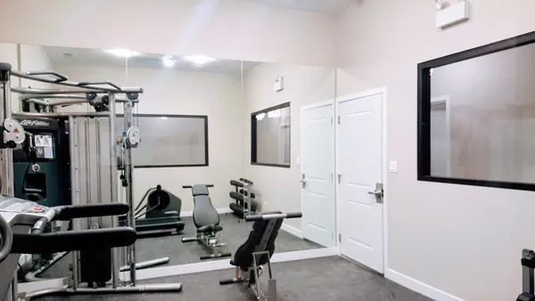 a view of a room with gym equipment