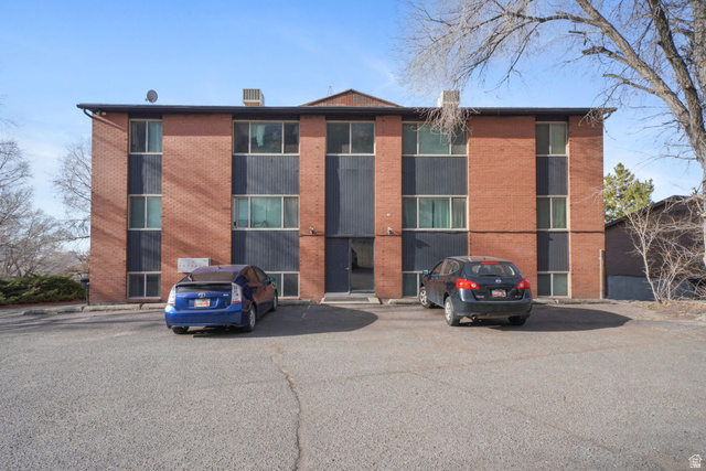 2030 Nevada Circle Provo, UT 84606 - Photo 2 of 16 View of apartment building / complex with uncovered parking