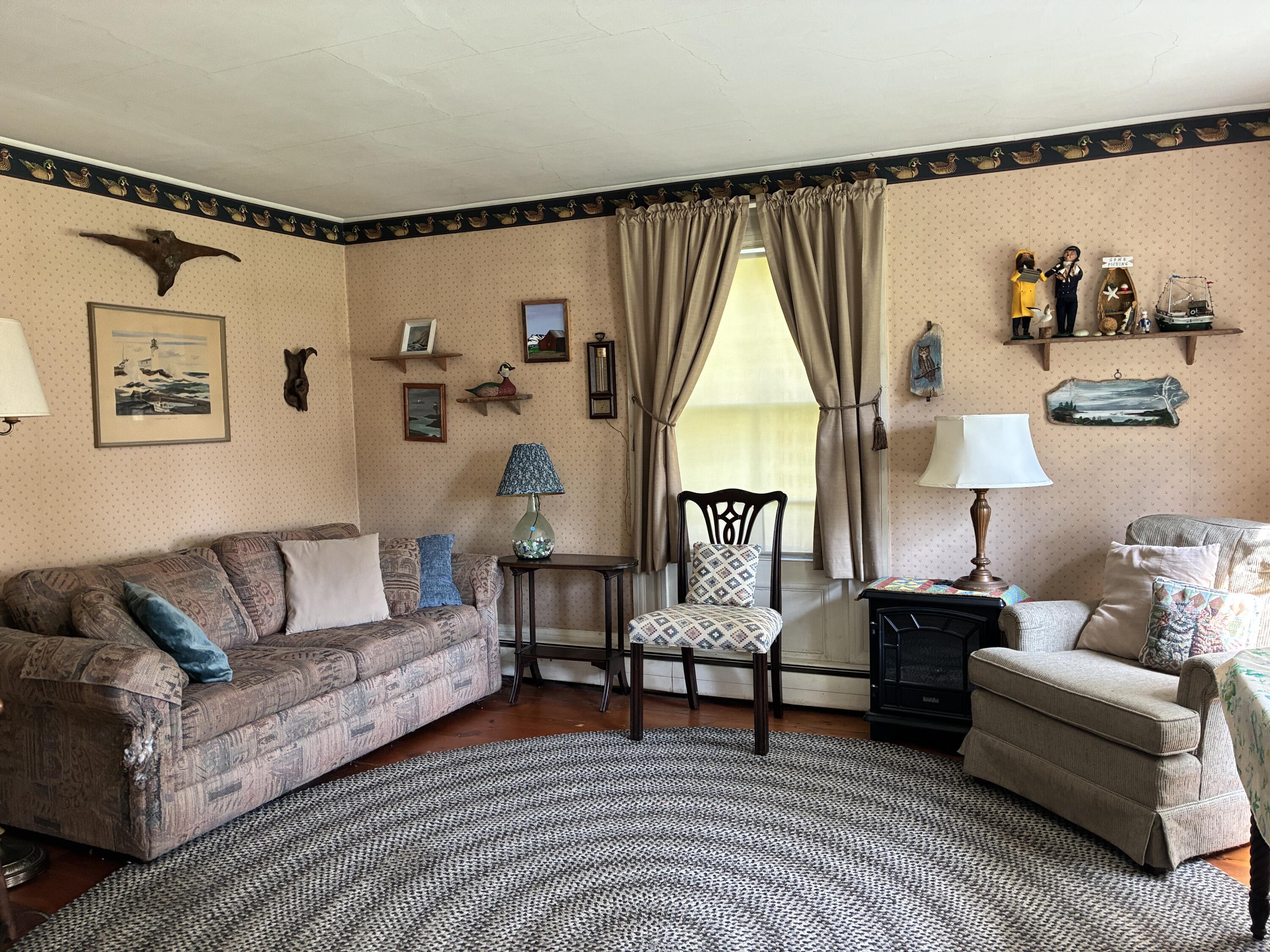 707 Newbury Neck Road Surry, ME 04684 - Photo 13 of 40 First floor den.