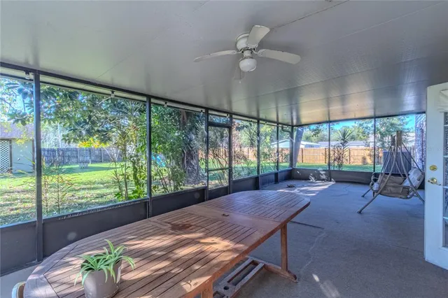 a view of a patio with a yard