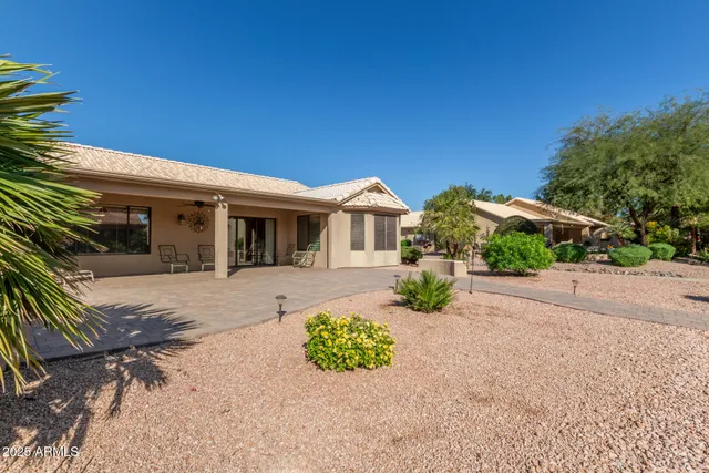 front view of a house with a patio