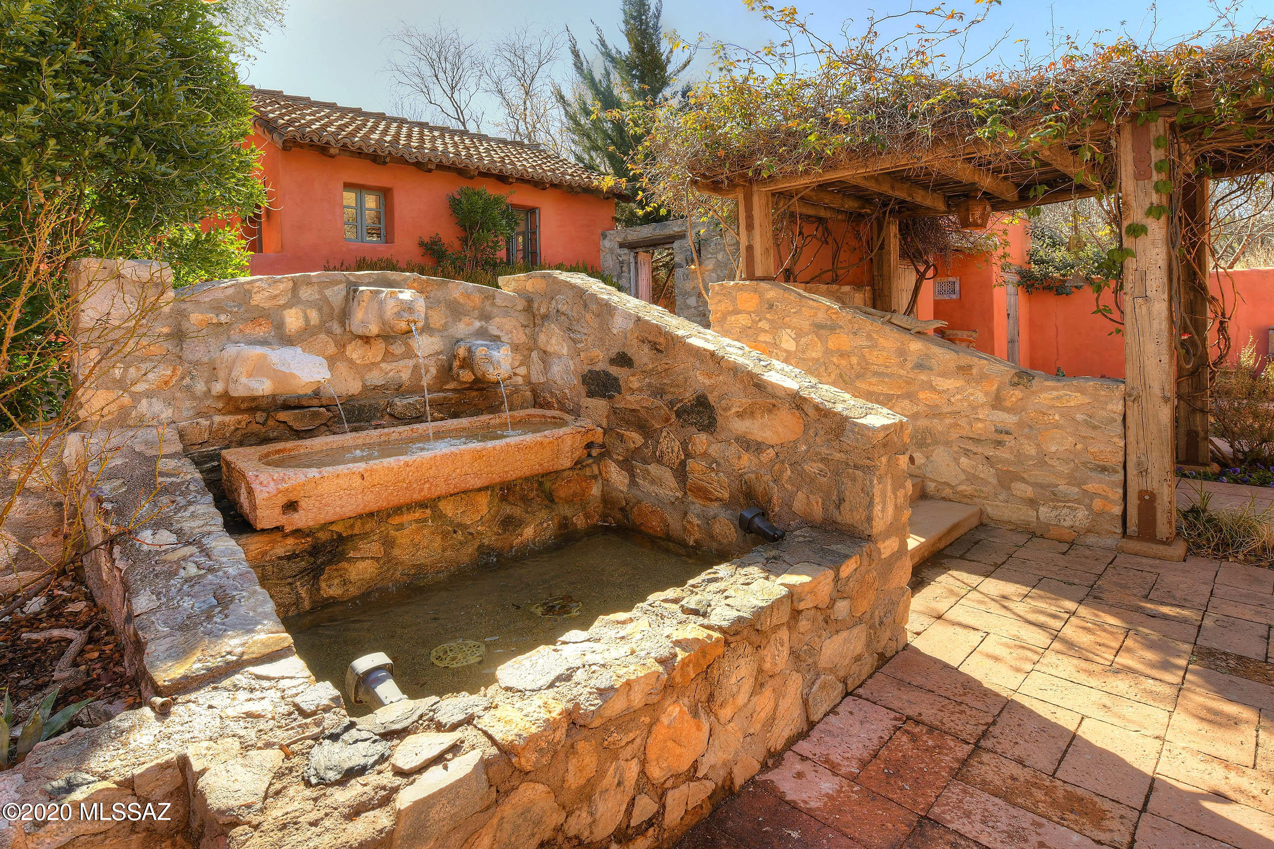 360 Harshaw Creek Road Patagonia, AZ 85624 - Photo 8 of 50 a view of a backyard with large trees