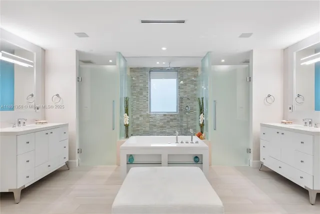 a bathroom with a sink a toilet and bathtub
