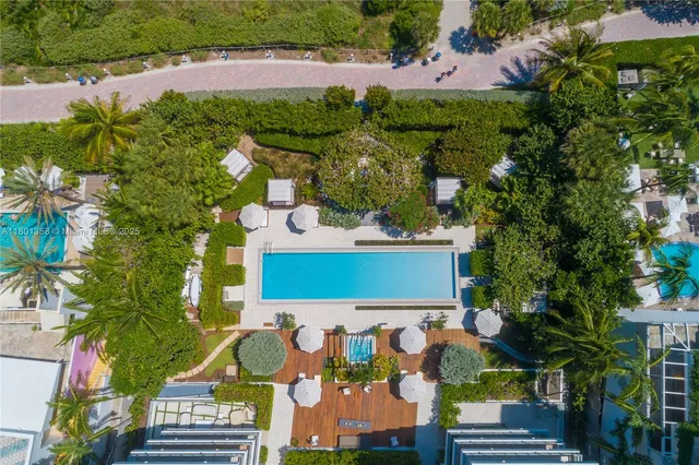 a bathroom with a shower curtain and a curtain