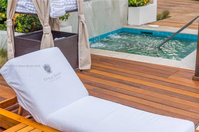 a view of a patio in the backyard